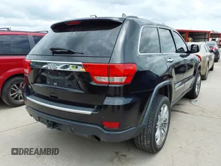 2013 Jeep Grand Cherokee Overland with VIN 1C4RJECT2DC588124, listed as a IAAI auction lot 42142573 with 204,309 mi miles and . Bid and sale history available at DreamBid. Image 4.