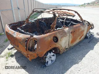 2019 MINI Convertible with VIN WMWWG5C53K3H07914, listed as a IAAI auction lot 41334872 with Not Provided miles and . Bid and sale history available at DreamBid. Image 4.