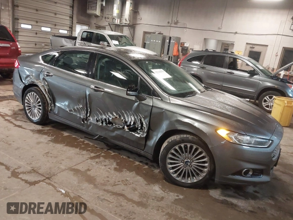 2013 Ford Fusion Titanium Hybrid with VIN 3FA6P0RU6DR319586, listed as a IAAI auction lot 42138979 with 125,388 mi miles. Bid and sale history available at carsss.com. Image 1.