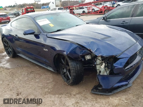 2018 Ford Mustang GT z VIN 1FA6P8CF0J5128561, wystawiony jako IAAI lot #41078319 z przebiegiem 72 615 mil mil oraz . Historia ofert i sprzedaży dostępna na DreamBid. Obrazek 1.