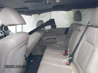 2014 Honda Pilot Touring with VIN 5FNYF4H97EB046879, listed as a IAAI auction lot 42017280 with 167,564 mi miles and . Bid and sale history available at carsss.com. Image 8.