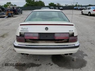 1997 Cadillac Seville Luxury SLS z VIN 1G6KS52Y0VU819998, wystawiony jako Copart lot #55979335 z przebiegiem 87 054 mil mil oraz Szkoda całkowita • Salvage title. Historia ofert i sprzedaży dostępna na DreamBid. Obrazek 6.