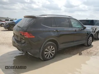 2018 Volkswagen Tiguan S with VIN 3VV1B7AX9JM020833, listed as a Copart auction lot 54539565 with 69,904 mi miles and Salvage title. Bid and sale history available at DreamBid. Image 3.