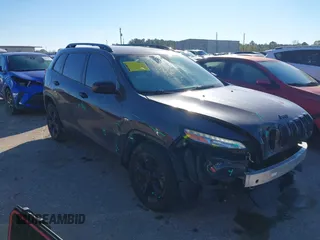 2016 Jeep Cherokee Sport with VIN 1C4PJLAS4GW329773, listed as a IAAI auction lot 41300023 with 101,912 mi miles and . Bid and sale history available at DreamBid. Image 1.