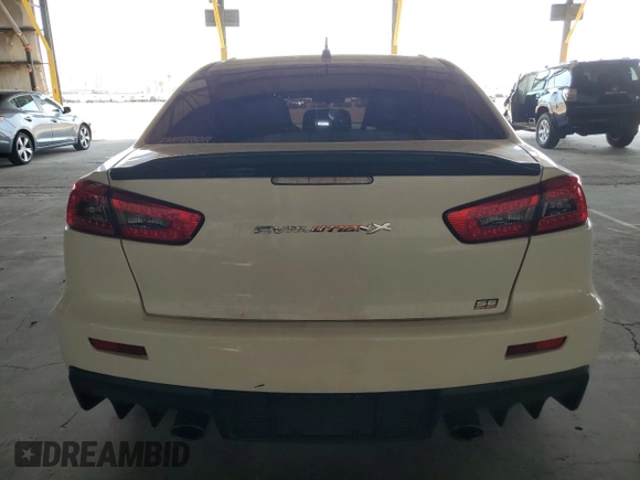 2010 Mitsubishi Lancer Evolution SE with VIN JA32W6FV8AU034077, listed as a Copart auction lot 64098154 with 120,041 mi miles and Salvage Title. Bid and sale history available at carsss.com. Image 6.