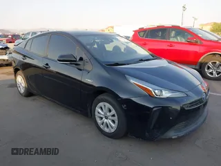 2021 Toyota Prius L Eco with VIN JTDKAMFU4M3148468, listed as a IAAI auction lot 42710611 with 160,129 mi miles and . Bid and sale history available at DreamBid. Image 1.