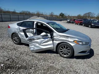 2017 Ford Fusion SE с VIN 3FA6P0H75HR370935, выставлен на аукционе Copart как лот 50082105 с пробегом 209 960 миль миль и Списание • Salvage title. История ставок и продаж доступна на DreamBid. Изображение 4.