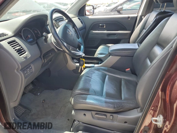 2007 Honda Pilot EX-L z VIN 5FNYF18577B007448, wystawiony jako Copart lot #58247885 z przebiegiem 167 628 mil mil oraz Czysty tytuł • Clean title. Historia ofert i sprzedaży dostępna na DreamBid. Obrazek 7.