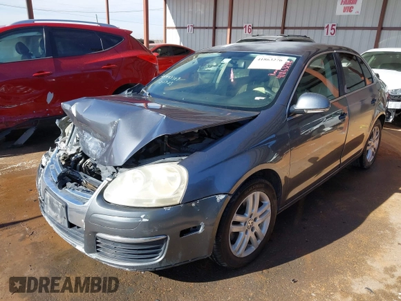 2007 Volkswagen Jetta 2.5 z VIN 3VWRF71K37M101410, wystawiony jako IAAI lot #41863276 z przebiegiem 195 616 mil mil oraz . Historia ofert i sprzedaży dostępna na DreamBid. Obrazek 2.
