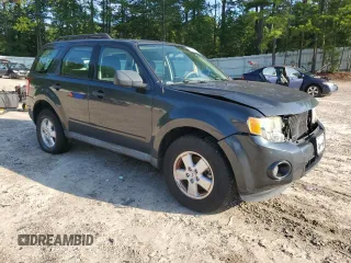 2009 Ford Escape XLS with VIN 1FMCU02739KD07929, listed as a Copart auction lot 64861745 with 144,914 mi miles and Clean title. Bid and sale history available at DreamBid. Image 4.