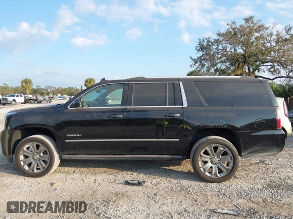 2019 GMC Yukon XL Denali with VIN 1GKS2HKJ2KR226275, listed as a IAAI auction lot 41552828 with 82,069 mi miles. Bid and sale history available at carsss.com. Image 15.