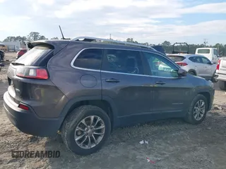 2019 Jeep Cherokee Latitude Plus z VIN 1C4PJLLB2KD143876, wystawiony jako IAAI lot #41660356 z przebiegiem 55 065 mil mil oraz . Historia ofert i sprzedaży dostępna na DreamBid. Obrazek 13.