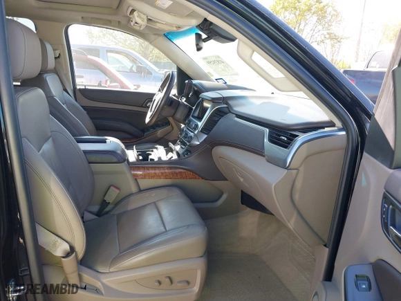 2015 Chevrolet Tahoe LTZ with VIN 1GNSCCKCXFR117525, listed as a IAAI auction lot 41839259 with 143,413 mi miles. Bid and sale history available at carsss.com. Image 5.