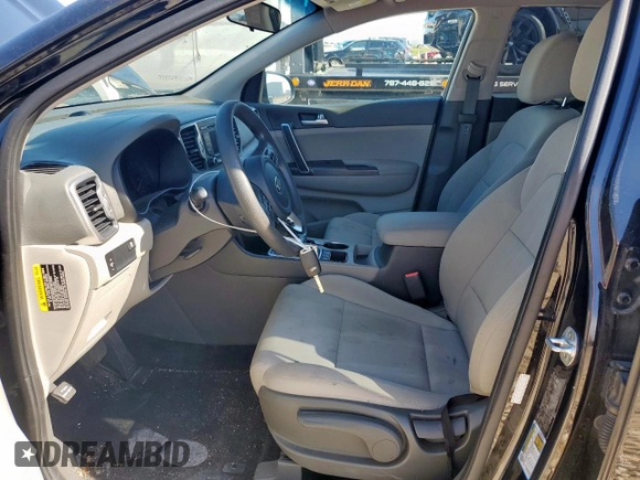 2017 Kia Sportage LX z VIN KNDPMCAC0H7229035, wystawiony jako Copart lot #58212175 z przebiegiem 66 041 mil mil oraz Szkoda całkowita • Salvage title. Historia ofert i sprzedaży dostępna na DreamBid. Obrazek 7.