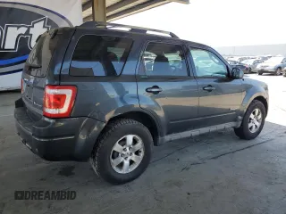 2010 Ford Escape Hybrid z VIN 1FMCU5K30AKA77460, wystawiony jako Copart lot #56363305 z przebiegiem 294 973 mil mil oraz Czysty tytuł • Clean title. Historia ofert i sprzedaży dostępna na DreamBid. Obrazek 3.