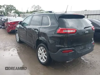 2016 Jeep Cherokee Latitude with VIN 1C4PJLCS4GW347185, listed as a IAAI auction lot 41909802 with 155,026 mi miles. Bid and sale history available at carsss.com. Image 3.