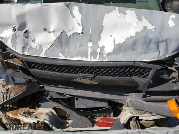 2003 Chevrolet Express Cargo z VIN 1GCFG15X531108386, wystawiony jako Copart lot #50409364 z przebiegiem Nie podano mil oraz Szkoda całkowita • Salvage title. Historia ofert i sprzedaży dostępna na DreamBid. Obrazek 13.
