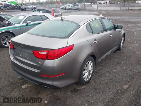 2015 Kia Optima LX with VIN 5XXGM4A76FG475908, listed as a IAAI auction lot 41964205 with 122,965 mi miles. Bid and sale history available at carsss.com. Image 4.