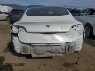 2023 Tesla Model 3 with VIN 5YJ3E1EA9PF546149, listed as a Copart auction lot 52104365 with 34,105 mi miles and Salvage Title. Bid and sale history available at DreamBid. Image 6.