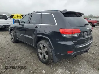 2015 Jeep Grand Cherokee Overland with VIN 1C4RJFCT2FC762573, listed as a Copart auction lot 59123275 with 229,128 mi miles and Salvage title. Bid and sale history available at DreamBid. Image 2.