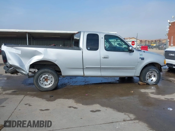 2001 Ford F-150 XL с VIN 1FTRX17L21NA88319, выставлен на аукционе IAAI как лот 41476671 с пробегом Не указан миль и . История ставок и продаж доступна на DreamBid. Изображение 14.