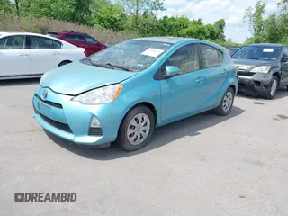 2014 Toyota Prius One with VIN JTDKDTB30E1077183, listed as a IAAI auction lot 42183675 with 92,560 mi miles and . Bid and sale history available at DreamBid. Image 2.