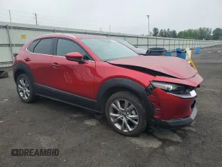 2021 Mazda CX-30 Premium with VIN 3MVDMBDL5MM212318, listed as a Copart auction lot 61057745 with 52,304 mi miles and Salvage title. Bid and sale history available at DreamBid. Image 4.