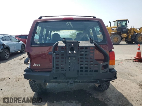 2000 Jeep Cherokee SE with VIN 1J4FF28S9YL133208, listed as a Copart auction lot 63827924 with 0 mi miles and Salvage Title. Bid and sale history available at carsss.com. Image 6.