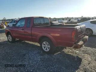2002 Nissan Frontier XE with VIN 1N6DD26S72C312325, listed as a Copart auction lot 66313655 with 168,667 mi miles and Clean title. Bid and sale history available at DreamBid. Image 2.