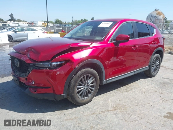 2019 Mazda CX-5 Touring with VIN JM3KFACM5K1516242, listed as a IAAI auction lot 42019803 with 113,953 mi miles. Bid and sale history available at carsss.com. Image 17.