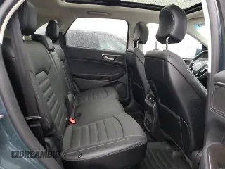2016 Ford Edge SEL z VIN 2FMPK3J95GBC01470, wystawiony jako Copart lot #56467345 z przebiegiem 121 308 mil mil oraz Szkoda całkowita • Salvage title. Historia ofert i sprzedaży dostępna na DreamBid. Obrazek 11.