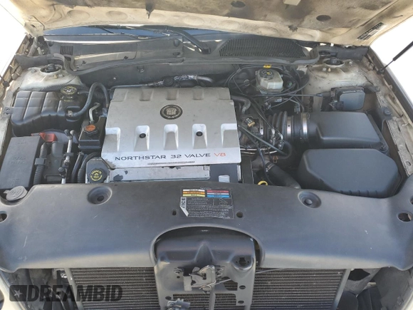 2001 Cadillac DeVille z VIN 1G6KD54Y61U227040, wystawiony jako Copart lot #46423295 z przebiegiem 180 289 mil mil oraz Szkoda całkowita • Salvage title. Historia ofert i sprzedaży dostępna na DreamBid. Obrazek 13.