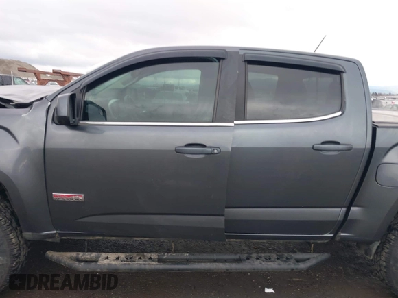 2016 GMC Canyon 4WD SLE with VIN 1GTG6CE37G1282630, listed as a IAAI auction lot 41153472 with 57,809 mi miles. Bid and sale history available at carsss.com. Image 14.