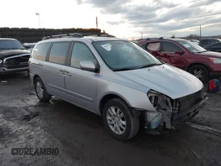 2007 Kia Sedona LX with VIN KNDMB233976172127, listed as a IAAI auction lot 41557356 with 164,383 mi miles. Bid and sale history available at carsss.com. Image 1.