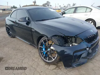 2019 BMW M2 Competition z VIN WBS2U7C53K7D29214, wystawiony jako IAAI lot #41920534 z przebiegiem 51 325 mil mil oraz . Historia ofert i sprzedaży dostępna na DreamBid. Obrazek 1.