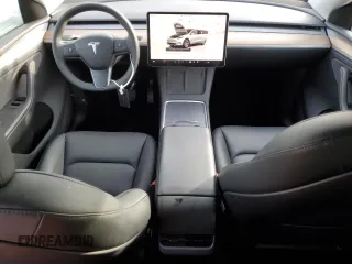 2023 Tesla Model Y Long Range with VIN 7SAYGDEE5PA125887, listed as a Copart auction lot 43188655 with 31,472 mi miles and Salvage Title. Bid and sale history available at DreamBid. Image 8.