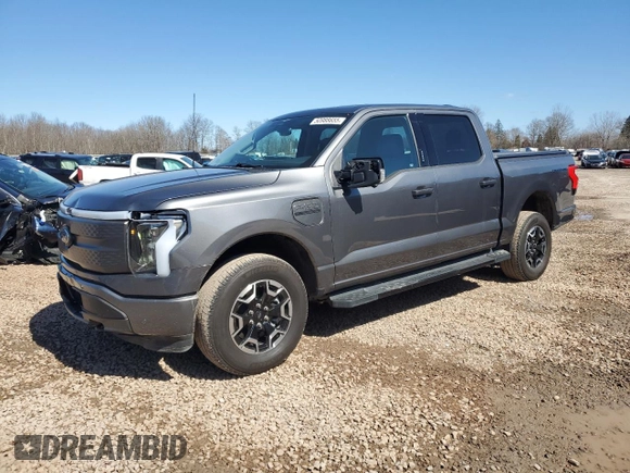 2023 Ford F-150 Lightning Pro z VIN 1FTVW1EL8PWG10894, wystawiony jako Copart lot #50988655 z przebiegiem 34 020 mil mil oraz Szkody całkowita. Historia ofert i sprzedaży dostępna na DreamBid. Obrazek 1.