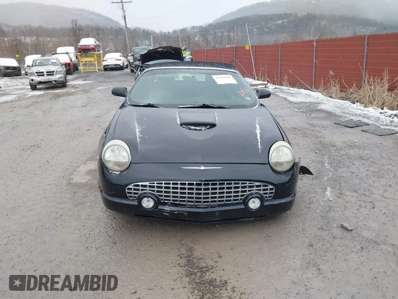 2003 Ford Thunderbird Deluxe z VIN 1FAHP60A53Y102920, wystawiony jako IAAI lot #41228106 z przebiegiem 90 854 mil mil oraz . Historia ofert i sprzedaży dostępna na DreamBid. Obrazek 13.