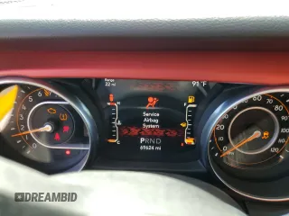 2020 Jeep Wrangler Unlimited Sport S с VIN 1C4HJXDG1LW189677, выставлен на аукционе Copart как лот 62716145 с пробегом 69 624 миль миль и Списание • Salvage title. История ставок и продаж доступна на DreamBid. Изображение 9.