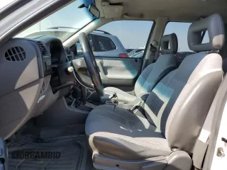 1999 Honda Passport LX с VIN 4S6CM58W9X4427075, выставлен на аукционе Copart как лот 65866554 с пробегом 227 454 миль миль и Списание • Salvage title. История ставок и продаж доступна на DreamBid. Изображение 7.
