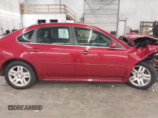 2014 Chevrolet Impala LT with VIN 2G1WB5E36E1133855, listed as a IAAI auction lot 41969358 with 148,897 mi miles and . Bid and sale history available at DreamBid. Image 14.