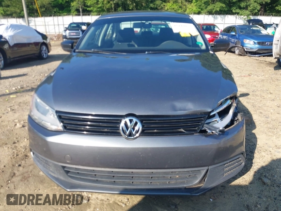 2014 Volkswagen Jetta S z VIN 3VW2K7AJ3EM303858, wystawiony jako IAAI lot #42449072 z przebiegiem 171 959 mil mil oraz . Historia ofert i sprzedaży dostępna na DreamBid. Obrazek 12.