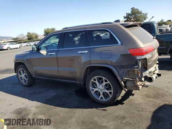 2019 Jeep Grand Cherokee Overland with VIN 1C4RJFCT7KC833390, listed as a Copart auction lot 74015774 with 64,598 mi miles and Salvage Title. Bid and sale history available at carsss.com. Image 2.