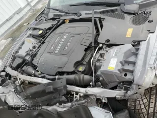2010 Jaguar XK with VIN SAJWA4GB4ALB37114, listed as a Copart auction lot 77673824 with 99,999 mi miles and Salvage Title. Bid and sale history available at carsss.com. Image 11.