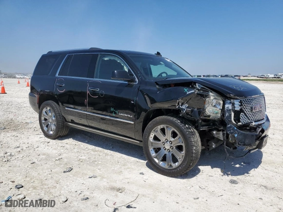2015 GMC Yukon Denali with VIN 1GKS1CKJXFR523628, listed as a Copart auction lot 51730455 with 59,695 mi miles and Salvage Title. Bid and sale history available at carsss.com. Image 4.