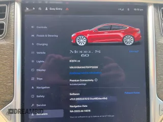 2013 Tesla Model S with VIN 5YJSA1AG7DFP12228, listed as a Copart auction lot 60040665 with 87,674 mi miles and Clean title. Bid and sale history available at DreamBid. Image 9.