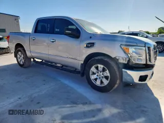 2017 Nissan Titan SV with VIN 1N6AA1EKXHN522857, listed as a Copart auction lot 61134785 with 168,380 mi miles and Salvage title. Bid and sale history available at DreamBid. Image 4.