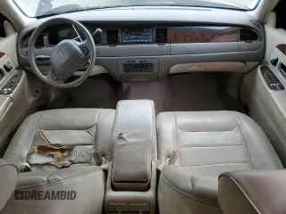 1999 Lincoln Town Car Executive z VIN 1LNHM81W5XY655075, wystawiony jako Copart lot #43263935 z przebiegiem Nie podano mil oraz Szkoda całkowita • Salvage title. Historia ofert i sprzedaży dostępna na DreamBid. Obrazek 8.