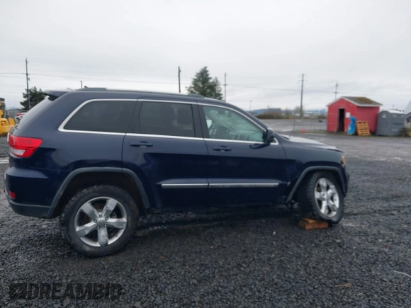 2012 Jeep Grand Cherokee Laredo with VIN 1C4RJFAG9CC220145, listed as a IAAI auction lot 41798457 with 130,603 mi miles. Bid and sale history available at carsss.com. Image 13.