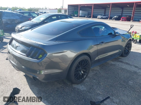 2017 Ford Mustang EcoBoost z VIN 1FA6P8TH5H5287023, wystawiony jako IAAI lot #42600833 z przebiegiem 103 685 mil mil oraz . Historia ofert i sprzedaży dostępna na DreamBid. Obrazek 4.